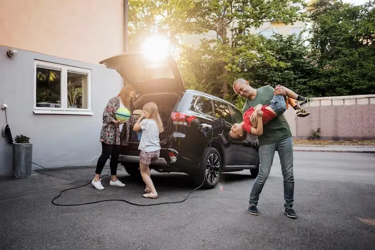 Family enjoying their electric SUV